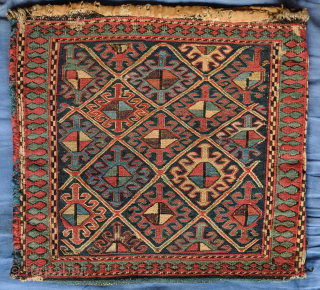 Shahsavan soumak bag, 19th century.  Colors include a wonderful green, deep purple and apricot as well as a deep indigo in the ground.  38 x 36 cm    