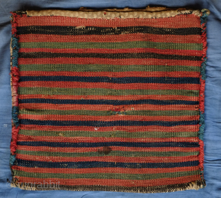 Shahsavan soumak bag, 19th century.  Colors include a wonderful green, deep purple and apricot as well as a deep indigo in the ground.  38 x 36 cm    