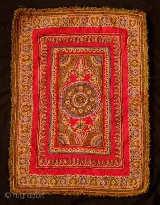 Kerman Embroidery Wall Hanging, Late 19th/early 20th Century. Good colors and workmanship. Loom woven wool ground cloth. Original cotton backing. Metallic thread fringes all around the edges. A gorgeous piece that strikes  ...