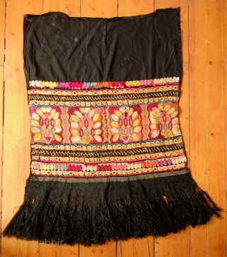 Hungarian silk embroidered apron, Early 20th Century. Silk embroidery on a cotton back with fine braided black silk tassels.  There is a stain on one of the floral sections.  Wonderful  ...