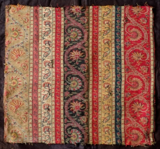 Kashmir Long Shawl Fragment, Early 19th Century. Woven in one long piece. Wide bands of elegant scrolling floral vines. It has a couple of areas of darning.  A wonderful example and  ...