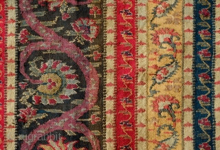 Kashmir Long Shawl Fragment, Early 19th Century. Woven in one long piece. Wide bands of elegant scrolling floral vines. It has a couple of areas of darning.  A wonderful example and  ...