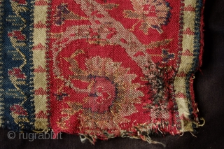 Kashmir Long Shawl Fragment, Early 19th Century. Woven in one long piece. Wide bands of elegant scrolling floral vines. It has a couple of areas of darning.  A wonderful example and  ...