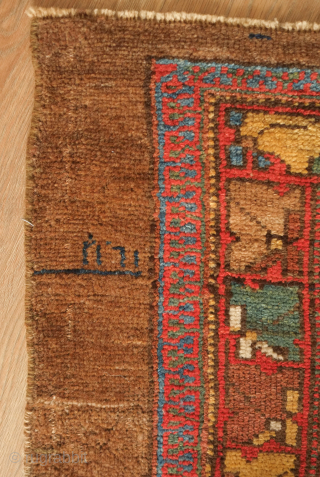 Hamadan long rug, 1904 inscription. Excellent colors, camel wool along the sides, very soft wool overall, and an intriguing abstract floral border.  121 x 313 cm. Contact danauger@tribalgardenrugs.com    
