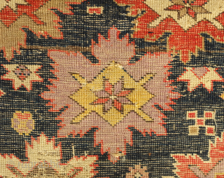 Shirvan-Kuba rug, dated to 1885.  Fine weave and good colors.  The purple has not faded so it seems to be a solid color.  Some noticeable wear but all there  ...