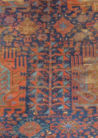 Timuri large rug, Mid-19th Century.  Harshang design scheme in deep, rich colors including the signature Timuri electric blue.  It still has its kilim ends.  Obvious wear but the rug  ...