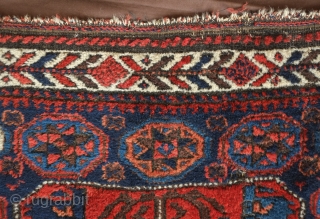 Baluch bag face, 19th century. Excellent soft pile and overall condition. Abstracted dragon motifs in the four corners of the central medallion. One of the blues is that Timuri electric blue. A  ...