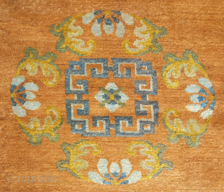 Tibetan rug, 19th or early 20th century. The field color is a wonderful shade between apricot and camel wool. Wonderful floral motifs and soft wool.  153 x 187 cm.  Contact  ...