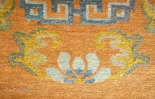 Tibetan rug, 19th or early 20th century. The field color is a wonderful shade between apricot and camel wool. Wonderful floral motifs and soft wool.  153 x 187 cm.  Contact  ...
