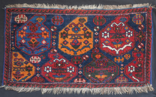 Afshar bag face, 19th century. Beautiful rich saturated colors including a deep green, a salmon red, a deep indigo blue, and mustardish yellow forming large, confident botehs. 66 x 36 cm, danauger@tribalgardenrugs.com 