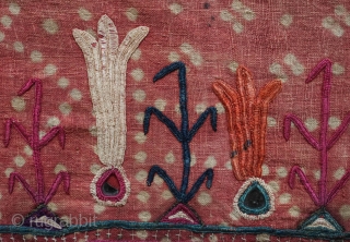 Kutch Embroidery hanging, 3rd-4th Quarter of the 19th century. The ground is in handspun cotton in a soft red with tie die patterning and wonderful silk embroidery.  It seems to have  ...