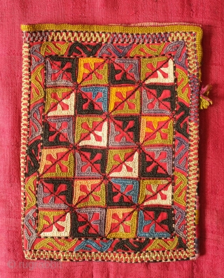 Ersari Silk Embroidered Pouch, 19th Century.  Wonderful natural colors with one of the blues being chemical and slightly faded to purple-grey.  The inner lining is in an attractive pastel toned  ...