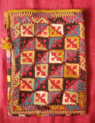 Ersari Silk Embroidered Pouch, 19th Century.  Wonderful natural colors with one of the blues being chemical and slightly faded to purple-grey.  The inner lining is in an attractive pastel toned  ...