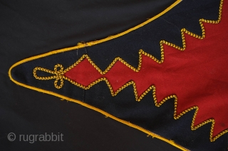 Balkan Ceremonial Saddle Cover, 1900 or so.  This is put together from sturdy broadcloth and yellow and blue cording.  It has wonderful colors and striking zigzag design.  The backing  ...