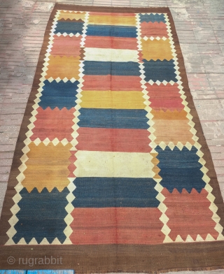 Tajik Arab Kilim, Late 19th century. Wonderful colors and design solid blocks of alternating color separated by continuous diamond borders. Sturdy construction in all wool with dark wool warps. There are a  ...