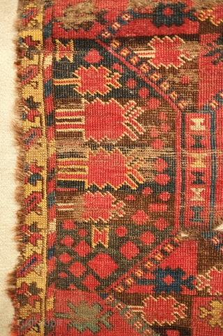 Beshir rug, 19th century. Atypical design scheme.  Worn but design visible.  Mounted on linen and ready for display.  107 x 209 cm, linen 130 x 237 cm. Contact danauger@tribalgardenrugs.com 