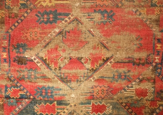 Beshir rug, 19th century. Atypical design scheme.  Worn but design visible.  Mounted on linen and ready for display.  107 x 209 cm, linen 130 x 237 cm. Contact danauger@tribalgardenrugs.com 