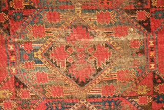 Beshir rug, 19th century. Atypical design scheme.  Worn but design visible.  Mounted on linen and ready for display.  107 x 209 cm, linen 130 x 237 cm. Contact danauger@tribalgardenrugs.com 