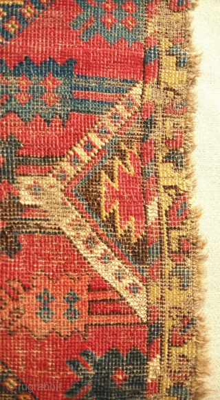 Beshir rug, 19th century. Atypical design scheme.  Worn but design visible.  Mounted on linen and ready for display.  107 x 209 cm, linen 130 x 237 cm. Contact danauger@tribalgardenrugs.com 