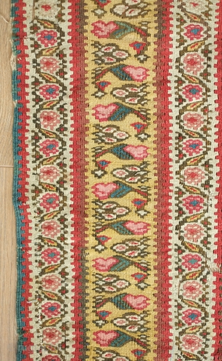 Senneh Kilim, 19th century.  Green in the ground populated with wonderfully drawn small shrubs. Mahi motifs in the central medallion.  Yellow border.  Some small areas of darning.  130  ...