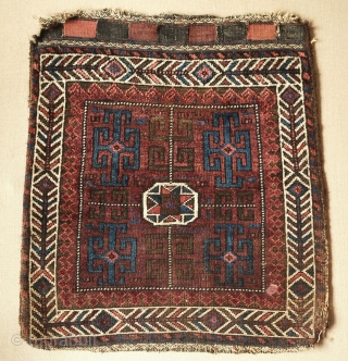 Baluch bag, Western Afghanistan, 19th century.  Long kochanaks.  Deep silky colors and wool.  Small spot in the bottom right corner.  66 x 75 cm.  Contact danauger@tribalgardenrugs.com  