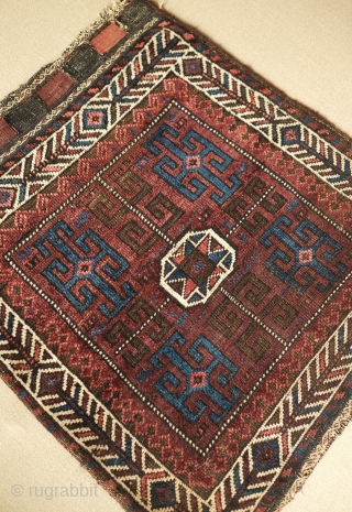 Baluch bag, Western Afghanistan, 19th century.  Long kochanaks.  Deep silky colors and wool.  Small spot in the bottom right corner.  66 x 75 cm.  Contact danauger@tribalgardenrugs.com  