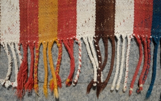 Qashqa'i Mowj, Late 19th Century. All good colors. Small tufts of wool decorating the field. Wonderful twill weave. A small repair in one of the brown stripes as seen in the 5th  ...