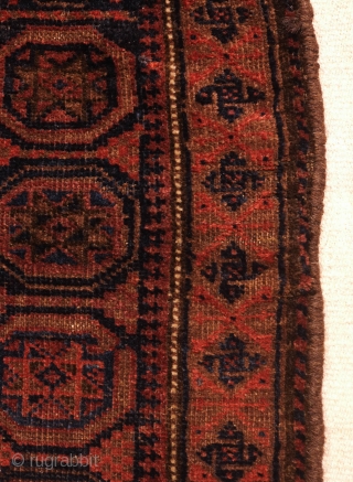 Baluch Bag, Late 19th/Early 20th Century.  Possibly Adraskhan area of western Afghanistan.  Dark and in muted tones on the front but captivating in design.  The back is in soft  ...