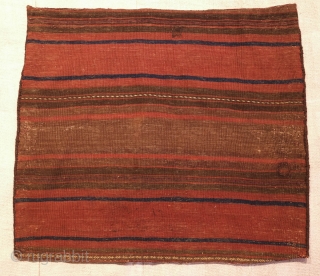 Baluch Bag, Late 19th/Early 20th Century.  Possibly Adraskhan area of western Afghanistan.  Dark and in muted tones on the front but captivating in design.  The back is in soft  ...