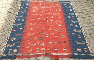 Azeri Shadda, 19th century.  Woven in two pieces. Covered in animal herds with their shepherds. A wonderful ethnographic scene.  162 x 193 cm. Contact danauger@tribalgardenrugs.com      