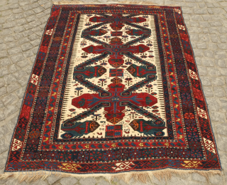 Zeikhur/Seichur rug dated to 1885.  The white ground makes for a wonderful foil for the large main motifs. Exceptional condition for it's age.  137 x 188 cm.  Contact danauger@tribalgardenrugs.com 