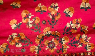 Phulkari, Late 19th century. Wonderful rich red ground with orange, green and white silk. In all around good shape with a bit of tear in the top left corner.  148 x  ...