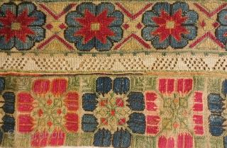 Greek Mainland Embroidery, 3rd-4th Quarter of the 19th Century.  Excellent cross stitch embroidery with large carnation-type floral motifs and two strips of trees of life or repeat pomegranate vines.  A  ...