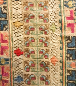 Greek Mainland Embroidery, 3rd-4th Quarter of the 19th Century.  Excellent cross stitch embroidery with large carnation-type floral motifs and two strips of trees of life or repeat pomegranate vines.  A  ...