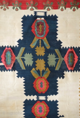 Karabagh Kilim, Late 19th century.  Finely woven, rich colors and wonderful border.  Cotton field with cross motifs in wool. 120 x 184 cm        