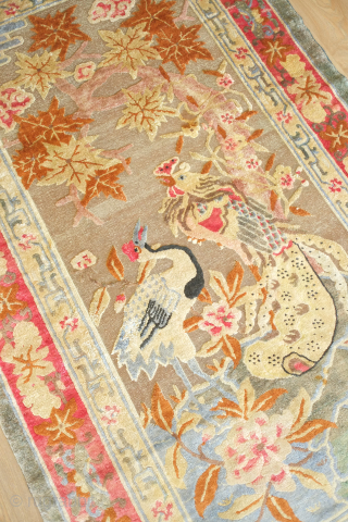 Ningxia Silk and Metallic thread rug, 3rd quarter of the 19th century.  Luxuriant color combination.  Depiction of a crane, symbolizing longevity, and a phoenix, the embodiment of fortuitous omens. Note  ...