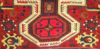 Kuba pole medallion rug, 19th century.  Fantastically drawn kochaks in the pole medallion.  It boasts a myriad of motifs such as Harshangs, swastikas, birds, Talish rosettes, tulips, compartments, and others.  ...