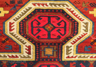 Kuba pole medallion rug, 19th century.  Fantastically drawn kochaks in the pole medallion.  It boasts a myriad of motifs such as Harshangs, swastikas, birds, Talish rosettes, tulips, compartments, and others.  ...