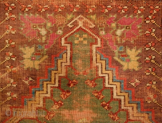 Mudjur Prayer Rug, Late 18th Century. Incredible colors. It contains a solid green field representing the heavens crested with a stunning cloud band. It is worn all over but its design elements  ...