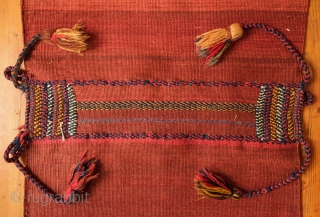 Khamseh Khorjin, late 19th century. A fantastic bag with almost all tassels in tact. Colorful and rich extra wrapping along the center. The wool is lustrous. In about as perfect condition as  ...