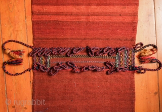 Khamseh Khorjin, late 19th century. A fantastic bag with almost all tassels in tact. Colorful and rich extra wrapping along the center. The wool is lustrous. In about as perfect condition as  ...