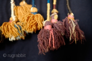 Malatya Kurdish hanging.  Late 19th Century.  Long tassels wrapped in naturally dyed wool ending in beautifully colored tufts.  Great natural colors overall.  It is an unusual piece that  ...
