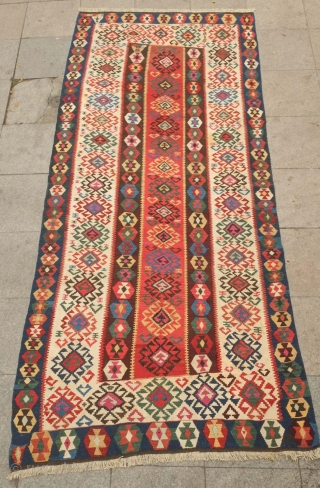 Gumusane or Kagizman kilim, late 19th century.  Wonderful colors on this tribal kilim.  A couple of light stains but do not detract from the overall piece.  128 x 288  ...