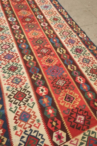 Gumusane or Kagizman kilim, late 19th century.  Wonderful colors on this tribal kilim.  A couple of light stains but do not detract from the overall piece.  128 x 288  ...