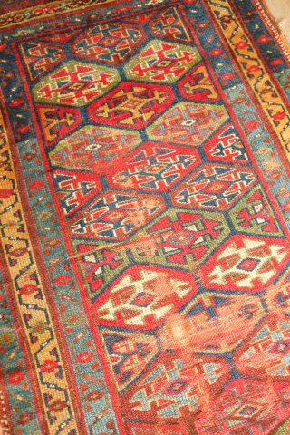Sauj Bulak fragment, 19th century.  Absolutely fantastic saturated natural colors and silky soft wool. A mesmerizing piece even as it is. 111 x 183 cm       