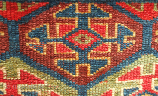 Sauj Bulak fragment, 19th century.  Absolutely fantastic saturated natural colors and silky soft wool. A mesmerizing piece even as it is. 111 x 183 cm       