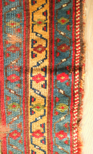 Sauj Bulak fragment, 19th century.  Absolutely fantastic saturated natural colors and silky soft wool. A mesmerizing piece even as it is. 111 x 183 cm       