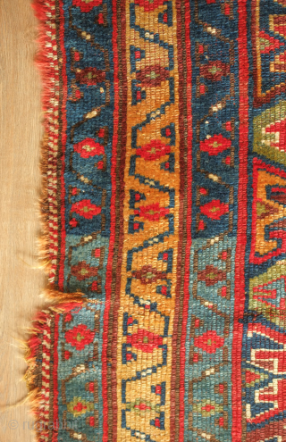 Sauj Bulak fragment, 19th century.  Absolutely fantastic saturated natural colors and silky soft wool. A mesmerizing piece even as it is. 111 x 183 cm       