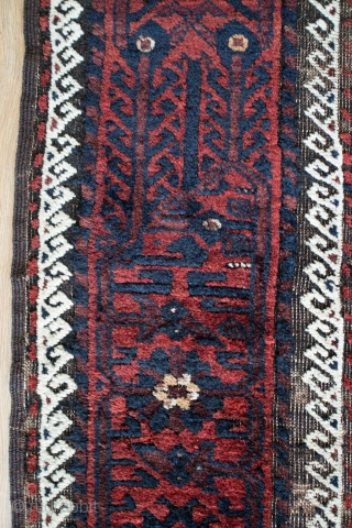 Baluch Rug, possibly Kashmar area Khorasan, Mid to 3rd quarter of the 19th Century.  Very dark brooding tones of blue and deep rich red.  Birds interspersed throughout the mina khani  ...