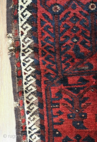 Baluch Rug, possibly Kashmar area Khorasan, Mid to 3rd quarter of the 19th Century.  Very dark brooding tones of blue and deep rich red.  Birds interspersed throughout the mina khani  ...